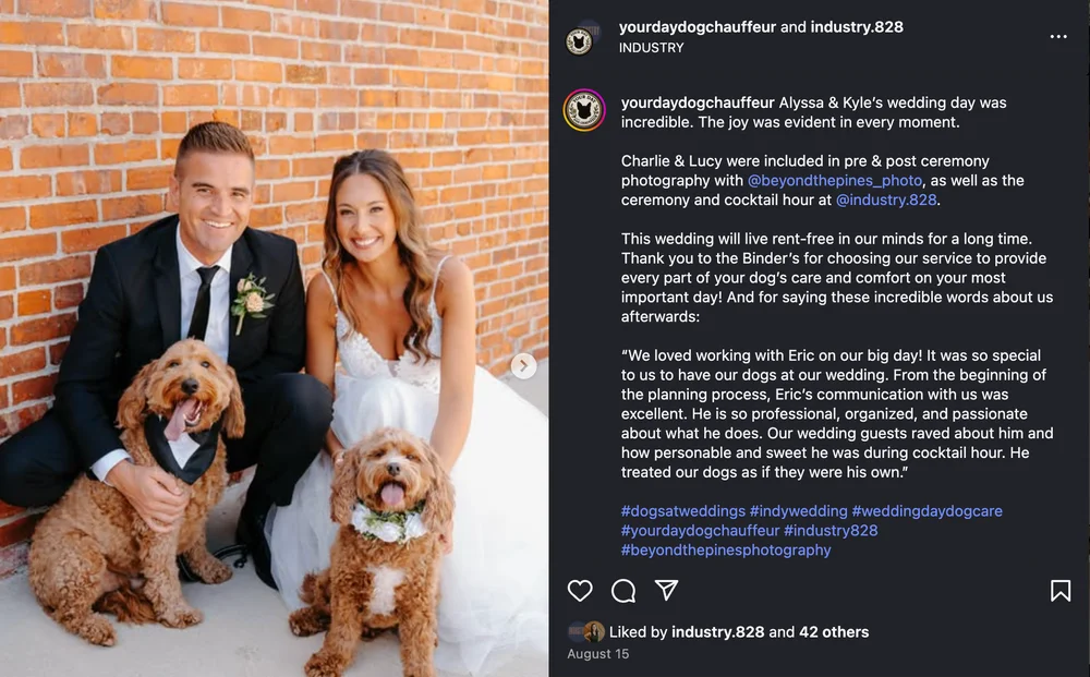 Screenshot of an Instagram post by Your Dog Day Chauffeur with a couple with their two doodle dogs outside of INDUSTRY in Indianapolis. Showcasing a dog-freindly wedding venue.