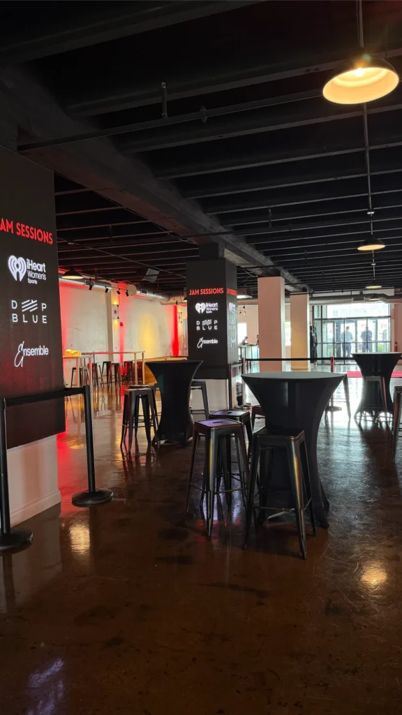 Branded pillars in the cocktail area of an experiential corporate event, enhancing brand visibility and guest experience