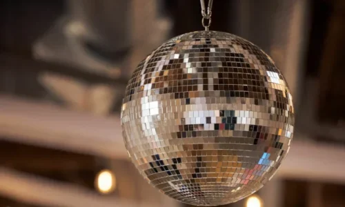 Large disco ball hanging at an event at Radius Venue in downtown Indianapolis