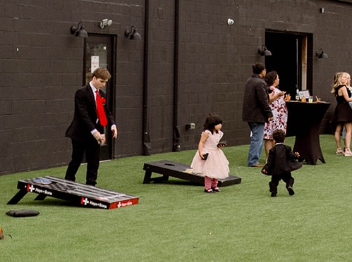 Lawn game bundle with cornhole, giant Jenga, and Connect Four at Radius Venue Indianapolis