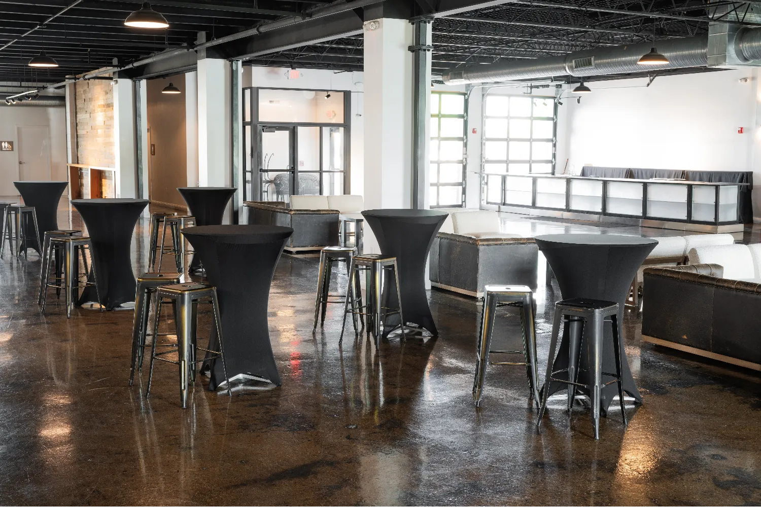 Black and royal blue cocktail table linens available for rent at Radius Venue Indianapolis