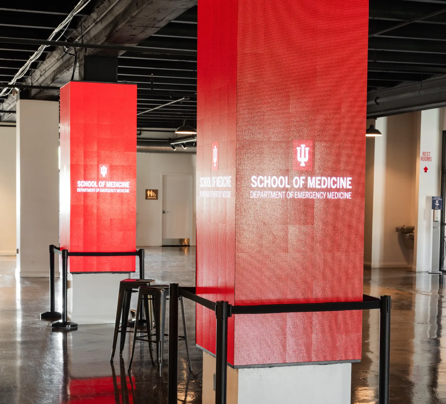 Two 4-sided LED columns displaying custom graphics at Radius Venue downtown Indianapolis